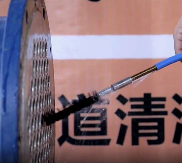Tube brush cleaning machine